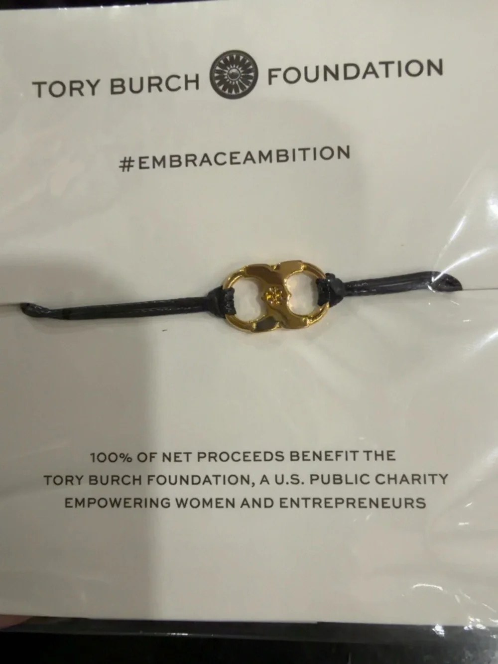Tory Burch Black Cord Bracelet with Gold Logo Charm